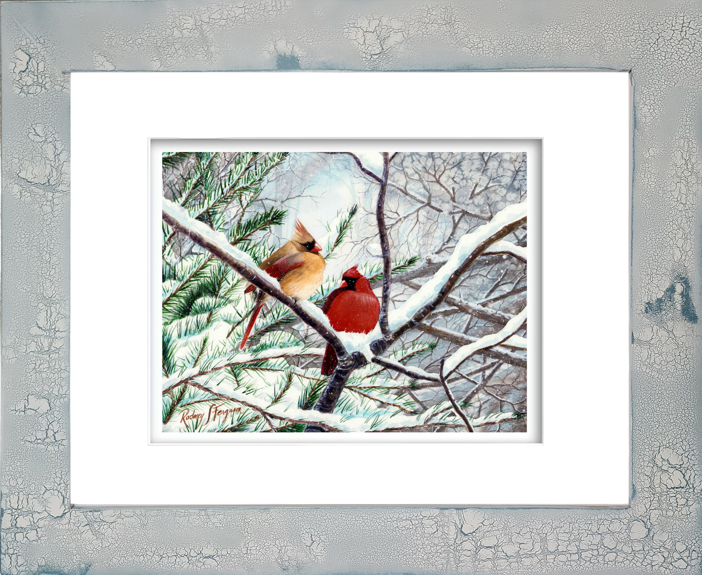 Watercolor giclée print of a pair of mating Northern Cardinals huddled together on a snowy winter branch, featuring vivid red plumage and delicate watercolor detail, mounted in Rodney Ferguson's handmade distressed and crackled coastal frame.